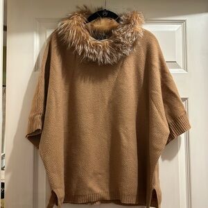One size fits all pullover top with fur.